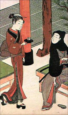 お茶を運ぶ娘